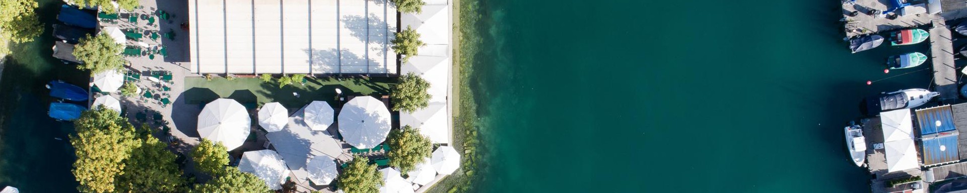 Aerial view of Bauschänzli in Zurich, representing DLT and blockchain in banking as the hero image of the article.