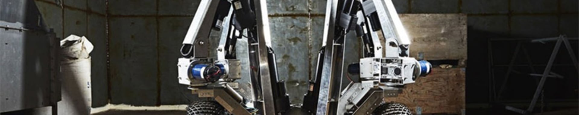 An industrial machine with wheels and light, suitable for precision farming, symbolizes agricultural innovation.