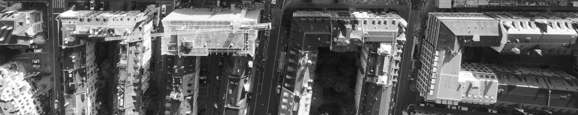 A black and white image of buildings in Zurich from a bird's eye view