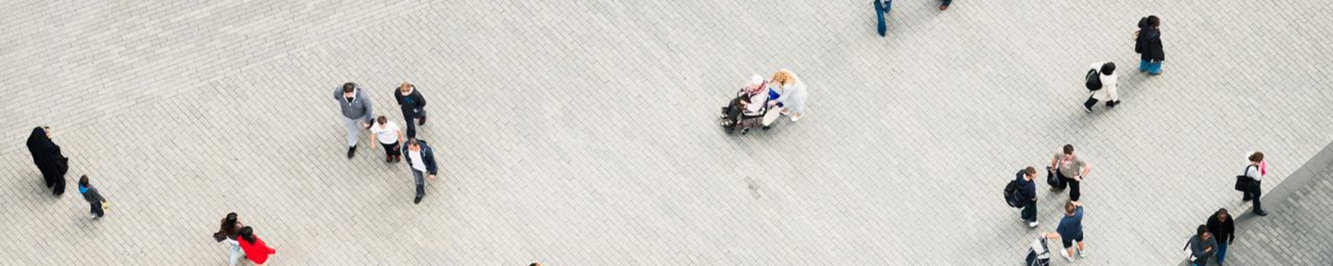 A plaza with many people symbolizes diversity.
