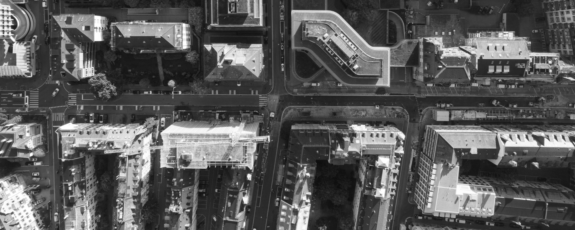 A black and white image of buildings in Zurich from a bird's eye view