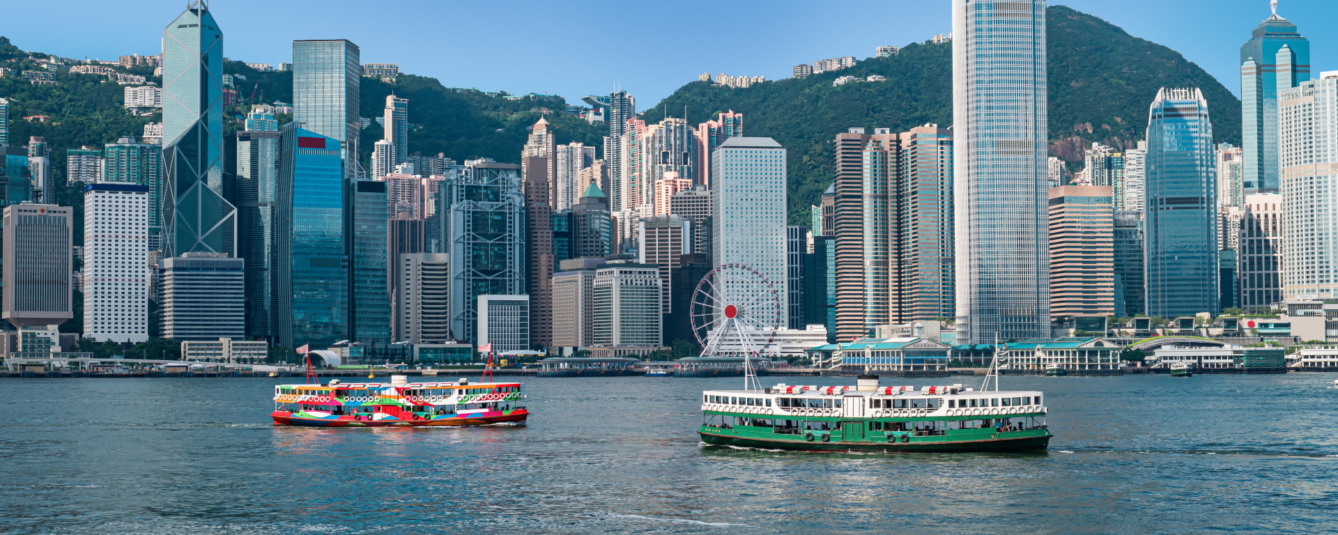Hong Kong skyline with ships in the foreground