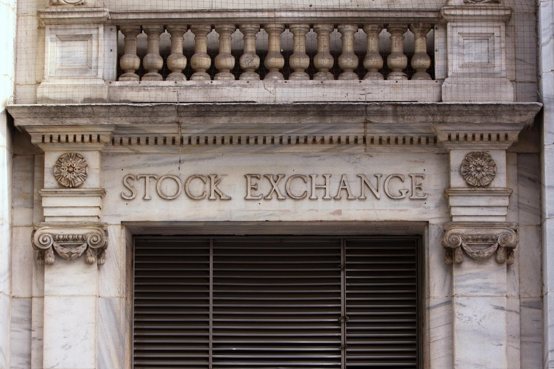 A prominent stock exchange building, symbolizing financial markets and trading activities, with a modern architectural design.