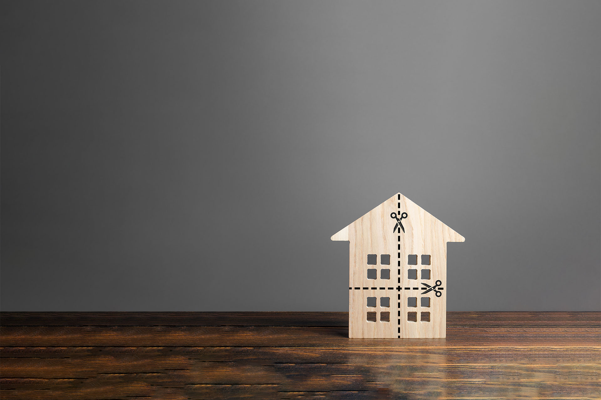 wooden house gets cut in pieces