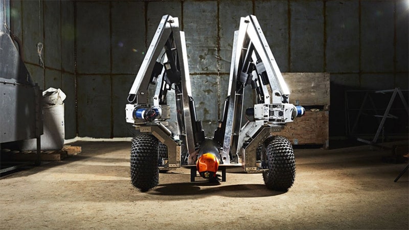 An industrial machine with wheels and light, suitable for precision farming, symbolizes agricultural innovation.