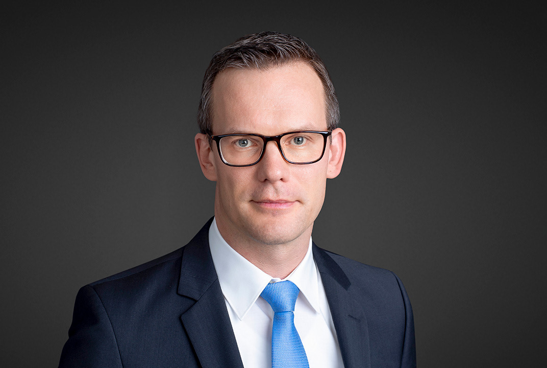 A portrait image of Florian Wegmann