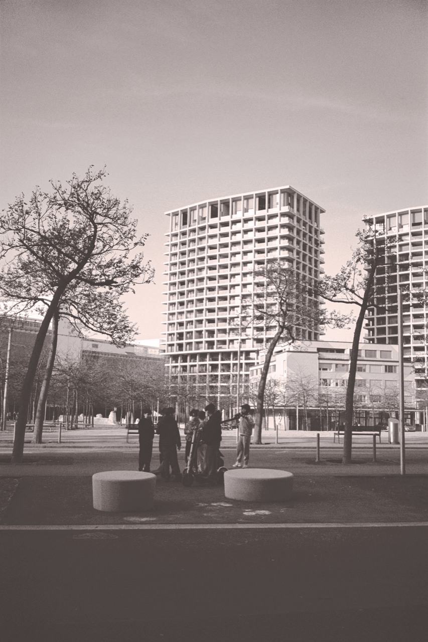 Black and white picture of young people in an urban setting by Jiajia Zhang