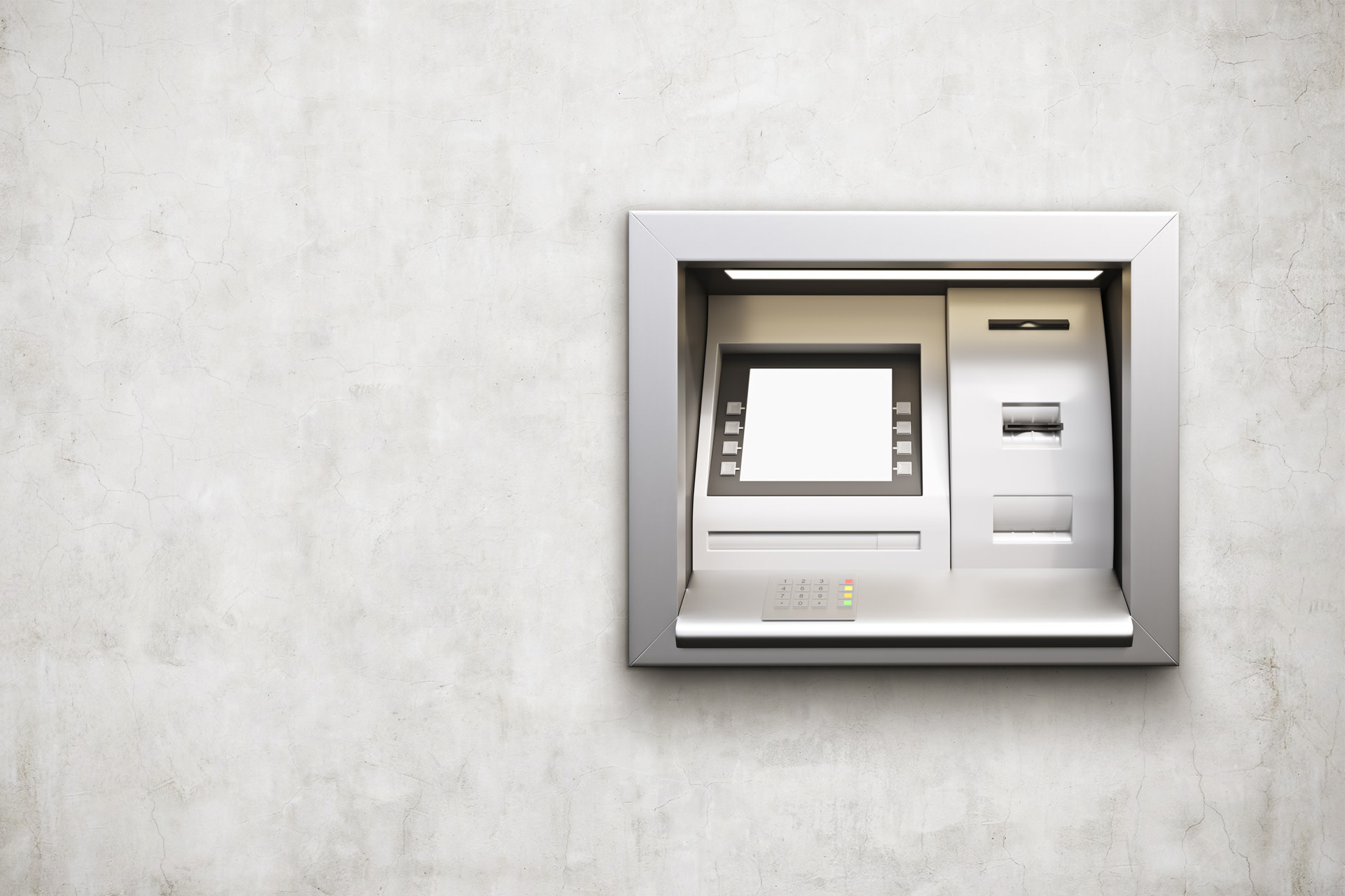 L'image d'un distributeur de billets symbolise les avertissements en matière de fraude et incite à la prudence.