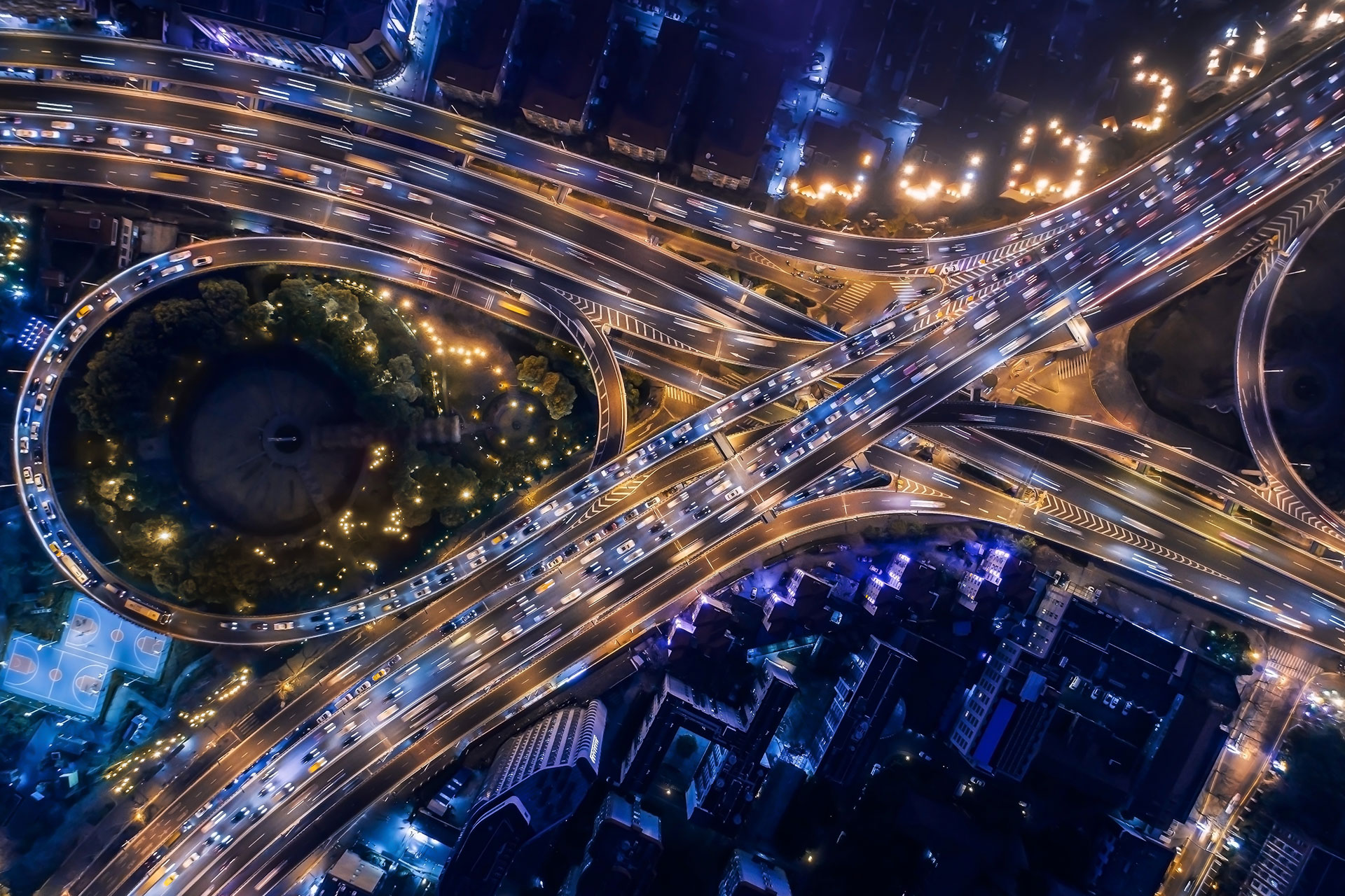 Birds eye view at night on busy highway traffic
