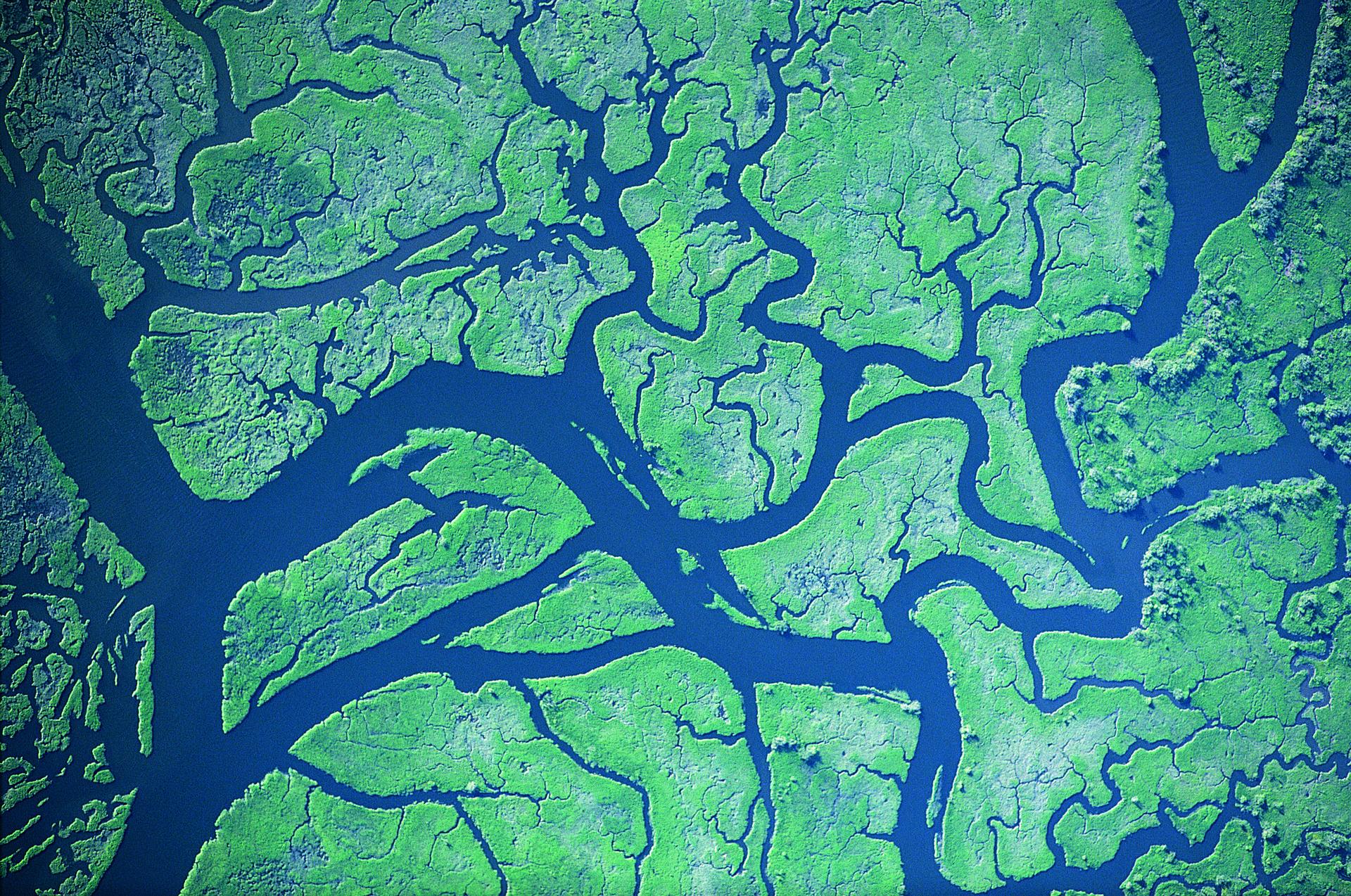 Aerial view of a river, showcasing the mesmerizing beauty of the world from above.